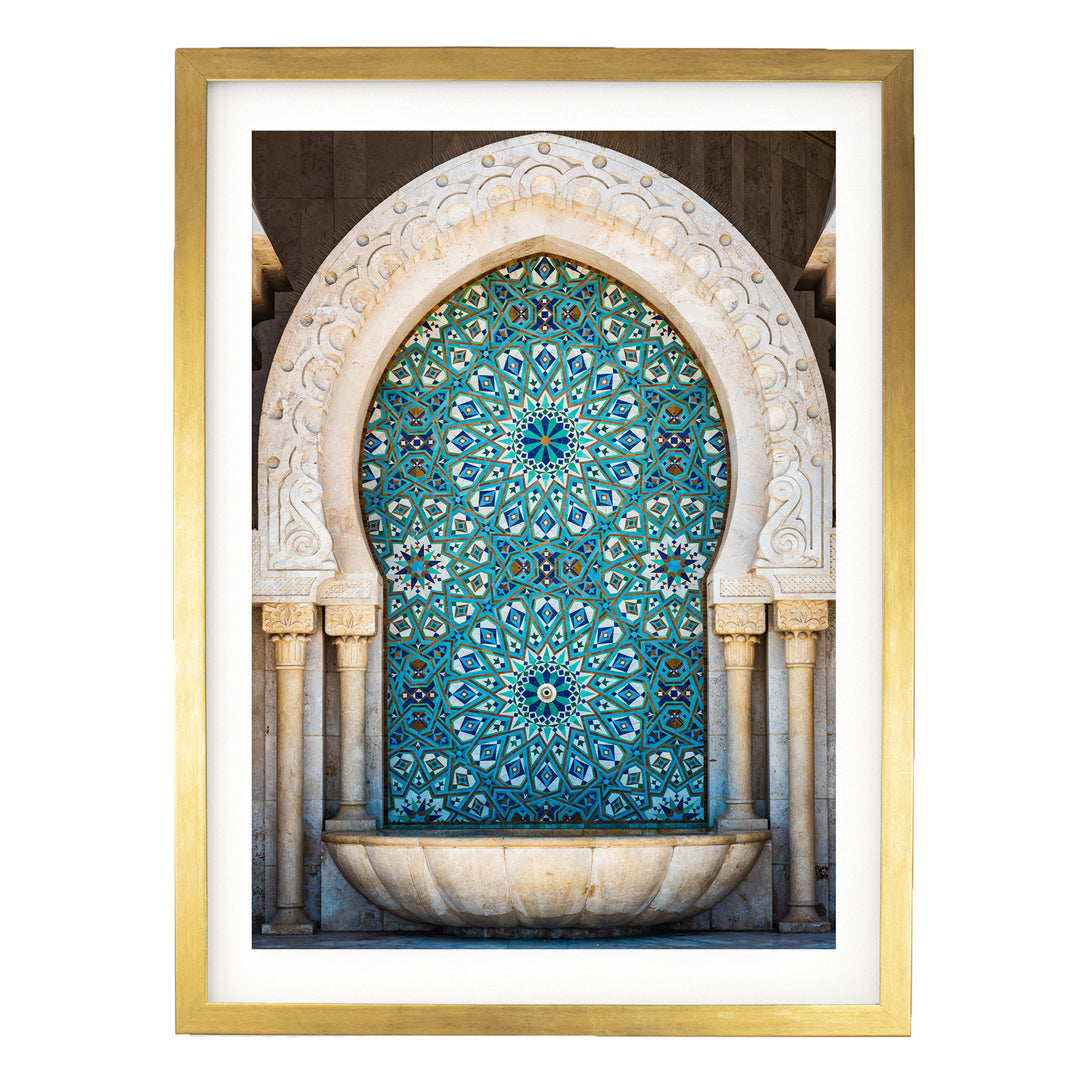a large, ornate archway with intricate blue and white tile work, creating a visually striking and detailed design.