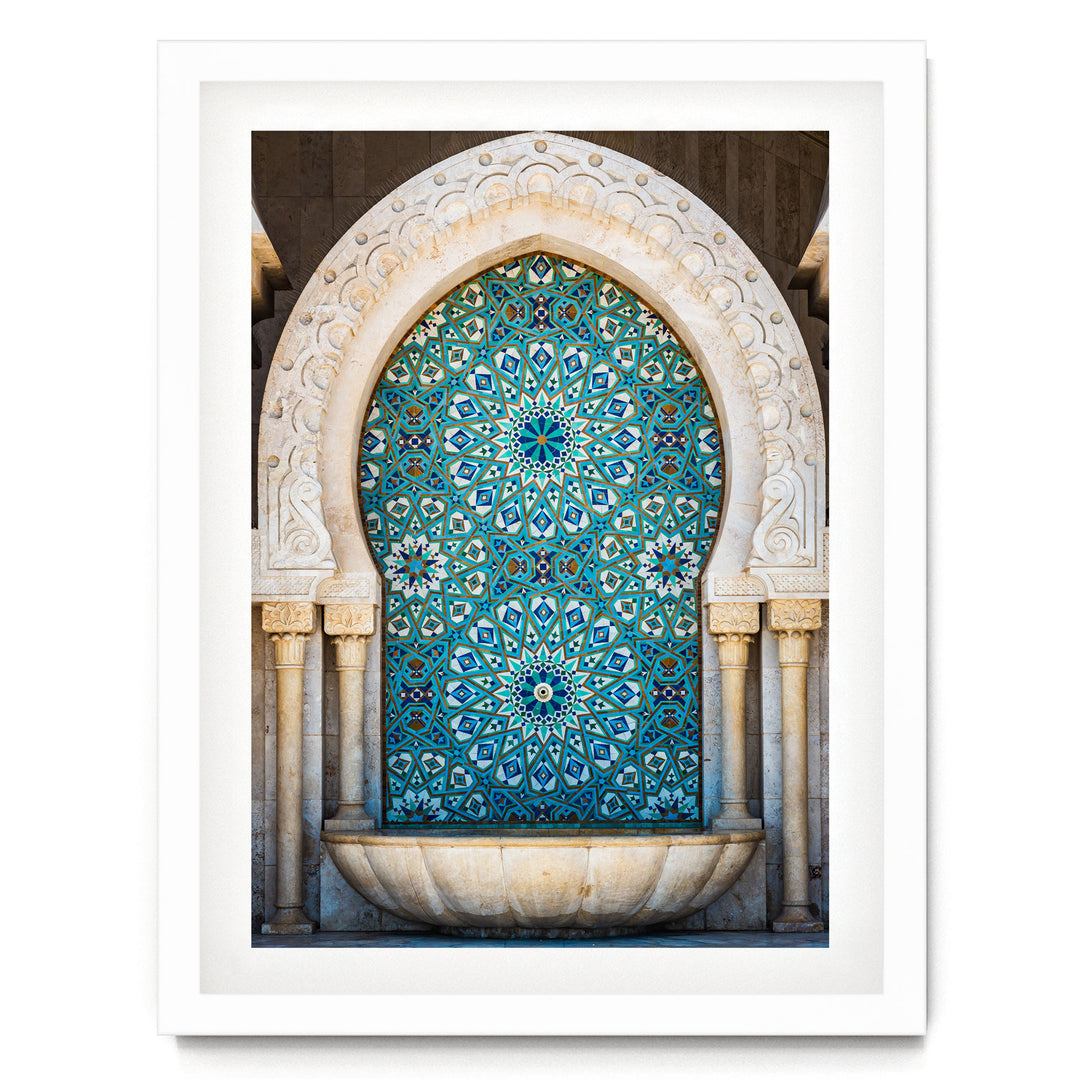 a large, ornate archway with intricate blue and white tile work, creating a visually striking and detailed design.