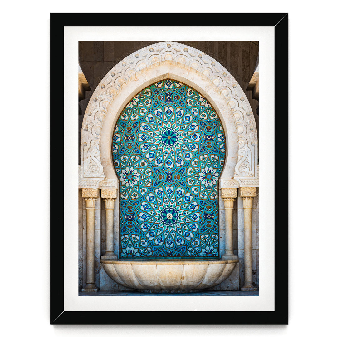 a large, ornate archway with intricate blue and white tile work, creating a visually striking and detailed design.
