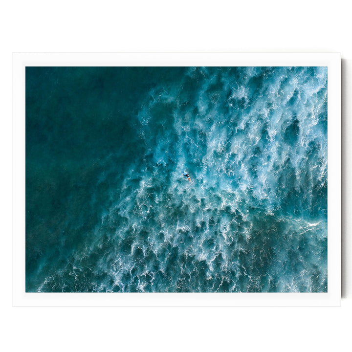 a surfer riding a wave in the ocean, with the wave's crest curling over and creating a dynamic scene.