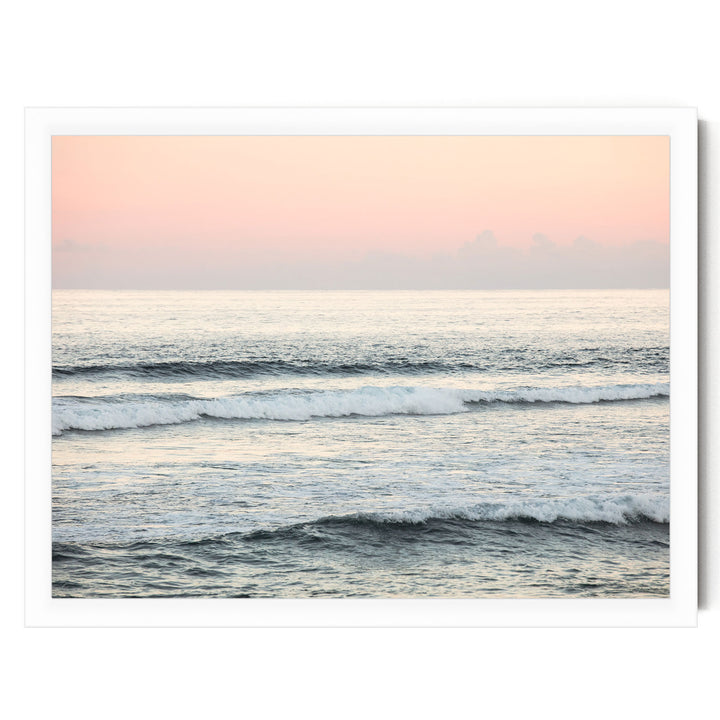 a serene ocean scene with waves gently rolling onto the shore, creating a tranquil atmosphere.