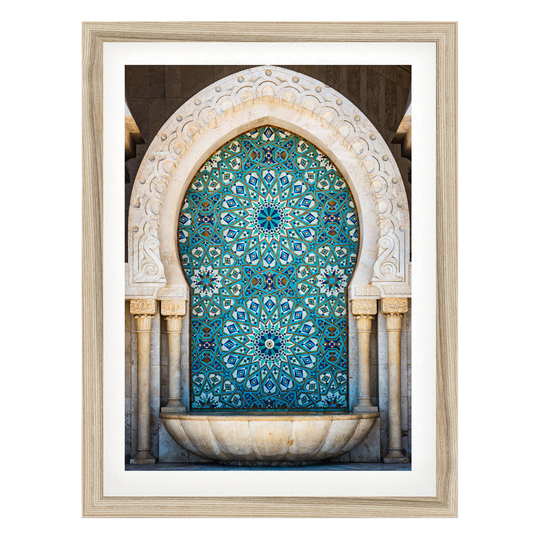 a large, ornate archway with intricate blue and white tile work, creating a visually striking and detailed design.