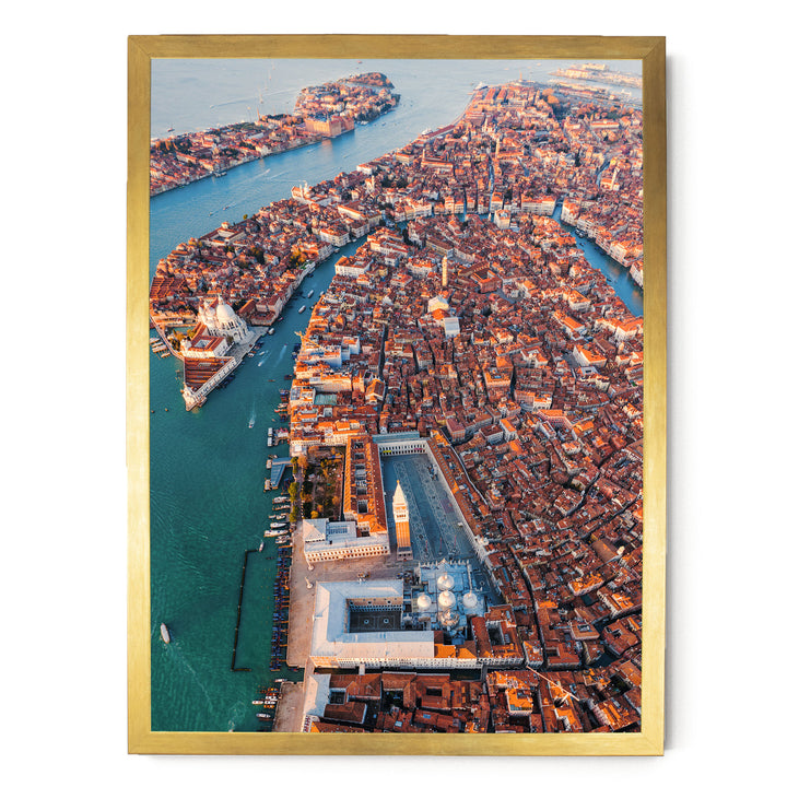 The image is an aerial view of a densely populated city with a river running through it. The city is filled with buildings and structures, creating a vibrant and bustling urban landscape.