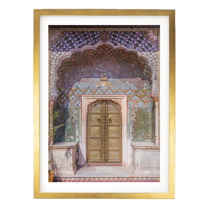 a beautifully decorated doorway with intricate patterns and designs, including a large archway and ornate golden doors.