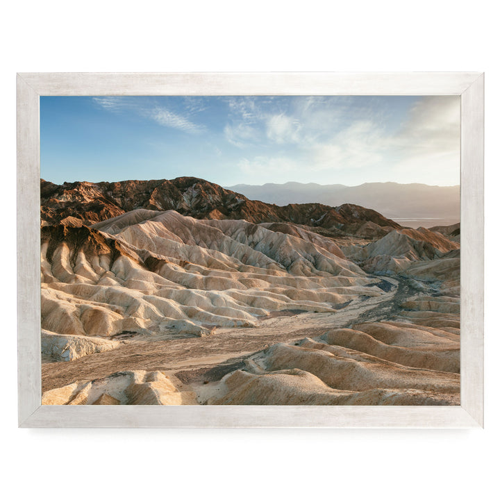 a vast, rugged landscape with rolling hills and valleys, showcasing the natural beauty of the terrain.