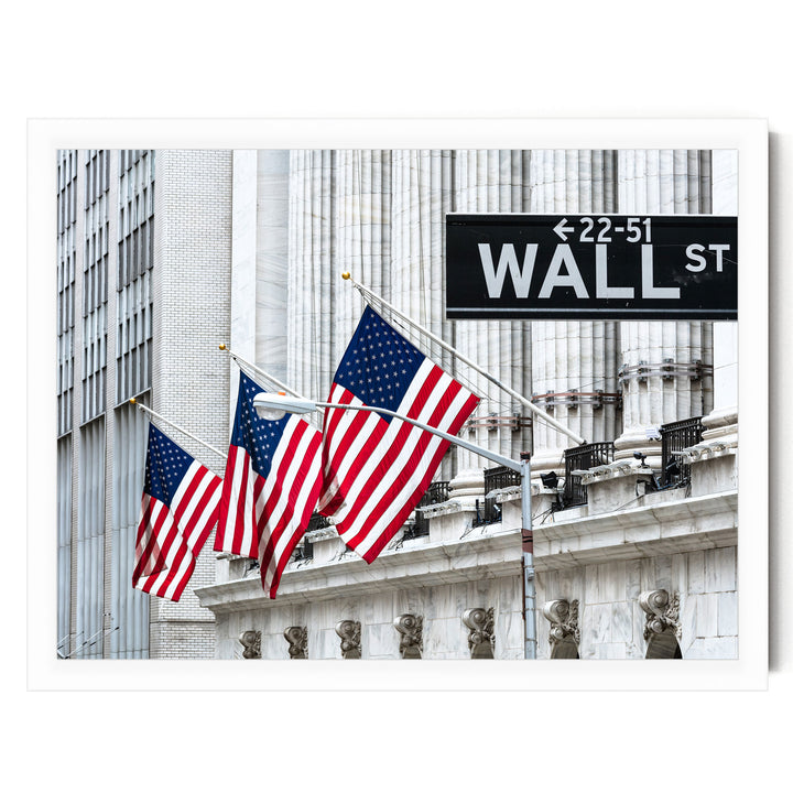 the iconic Wall Street building with three American flags flying in front of it, and a street sign indicating the location as 22-51 Wall St.