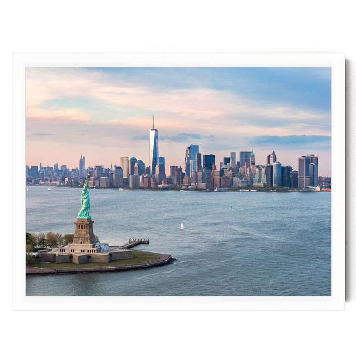 the Statue of Liberty standing on a small island in the foreground, with the New York City skyline visible in the background.