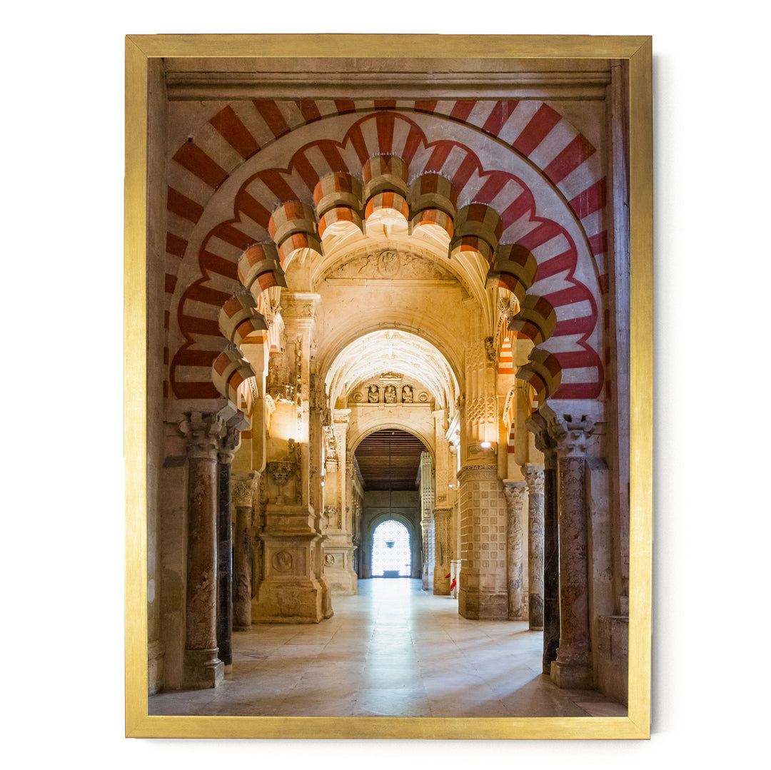 a grand, ornate hallway with arched doorways and columns, creating an impressive architectural space.