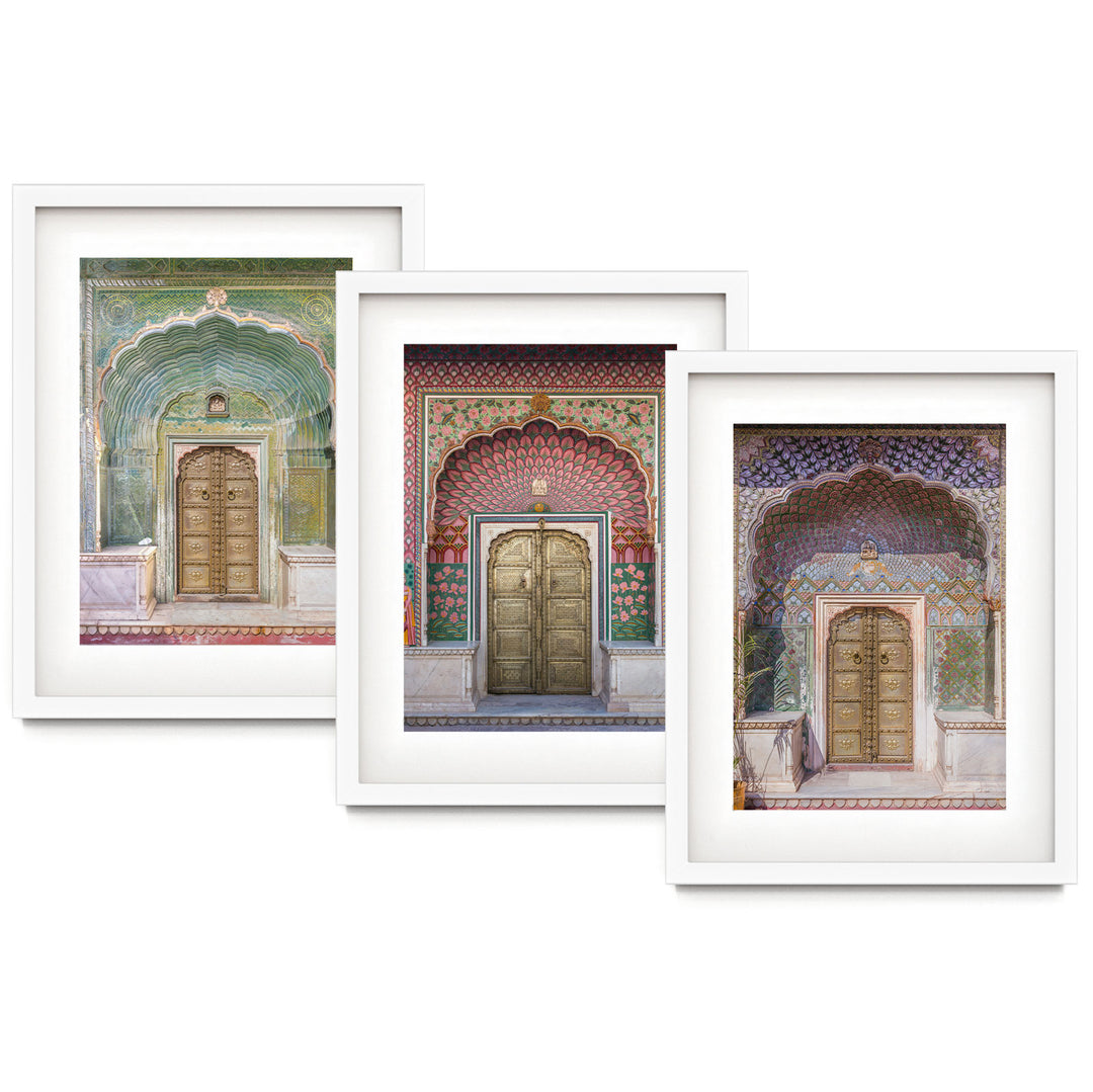 three framed pictures of doorways in a building