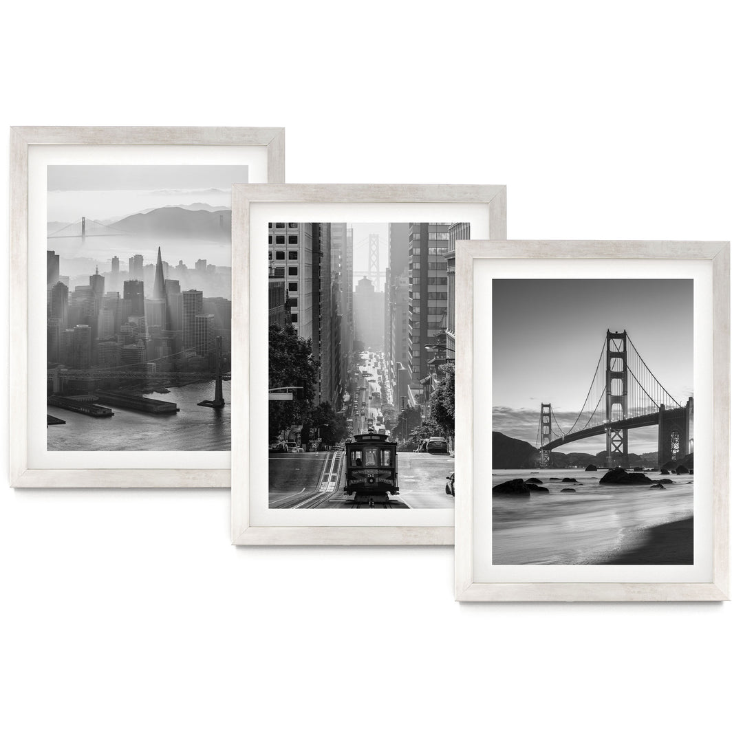 The image is a collage of three framed black and white photographs depicting various city scenes, including a cityscape, a trolley car, and a bridge.