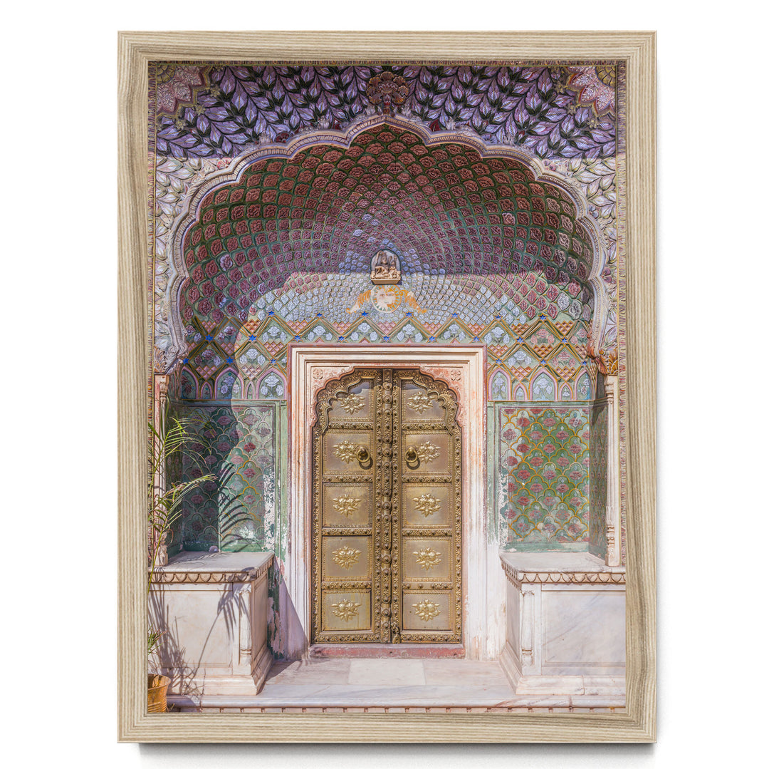 a beautifully decorated doorway with intricate patterns and designs, including a large archway and ornate golden doors.