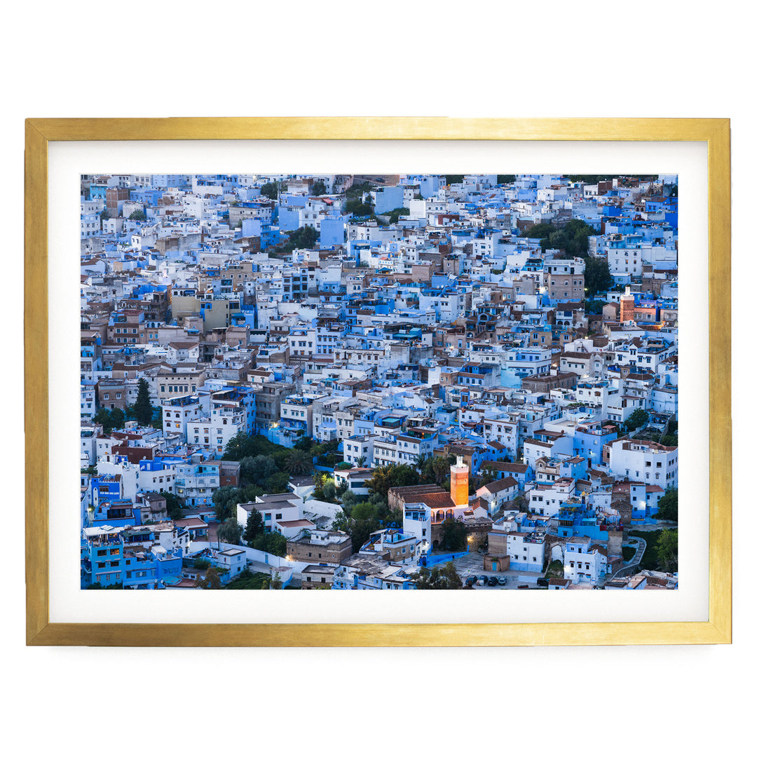 The image is a densely packed cityscape with numerous buildings in shades of blue and white, creating a visually striking and vibrant urban landscape.