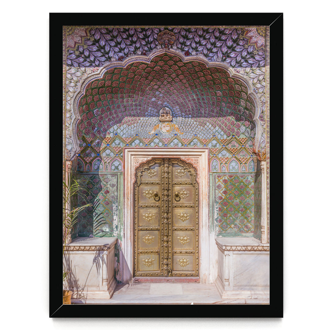a beautifully decorated doorway with intricate patterns and designs, including a large archway and ornate golden doors.