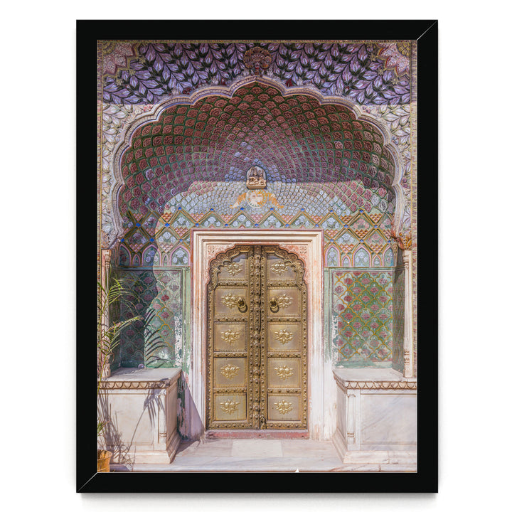 a beautifully decorated doorway with intricate patterns and designs, including a large archway and ornate golden doors.