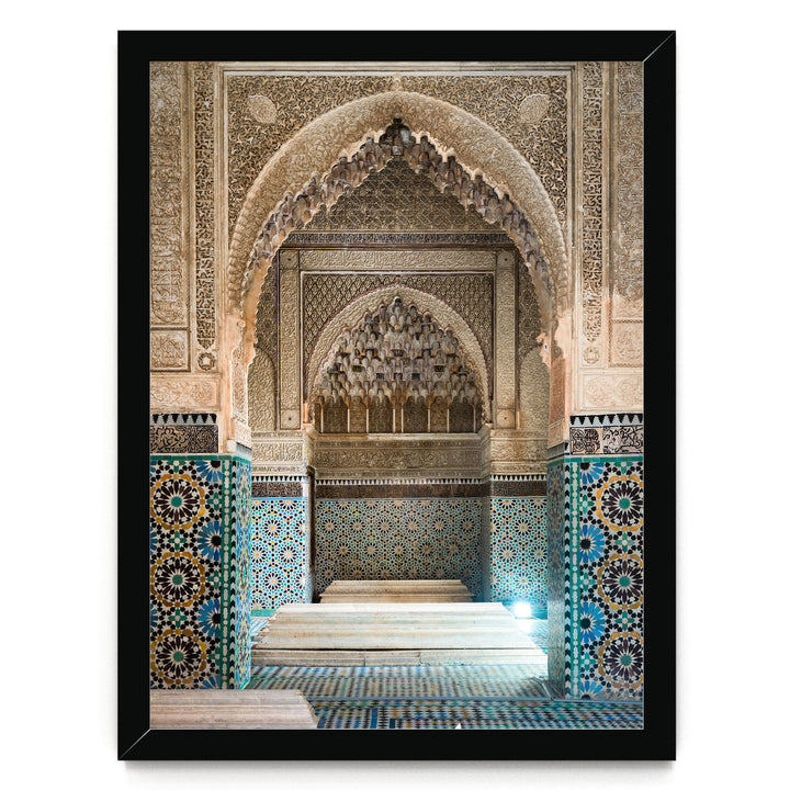 an ornate, intricately decorated interior space with a large archway and a tiled floor.