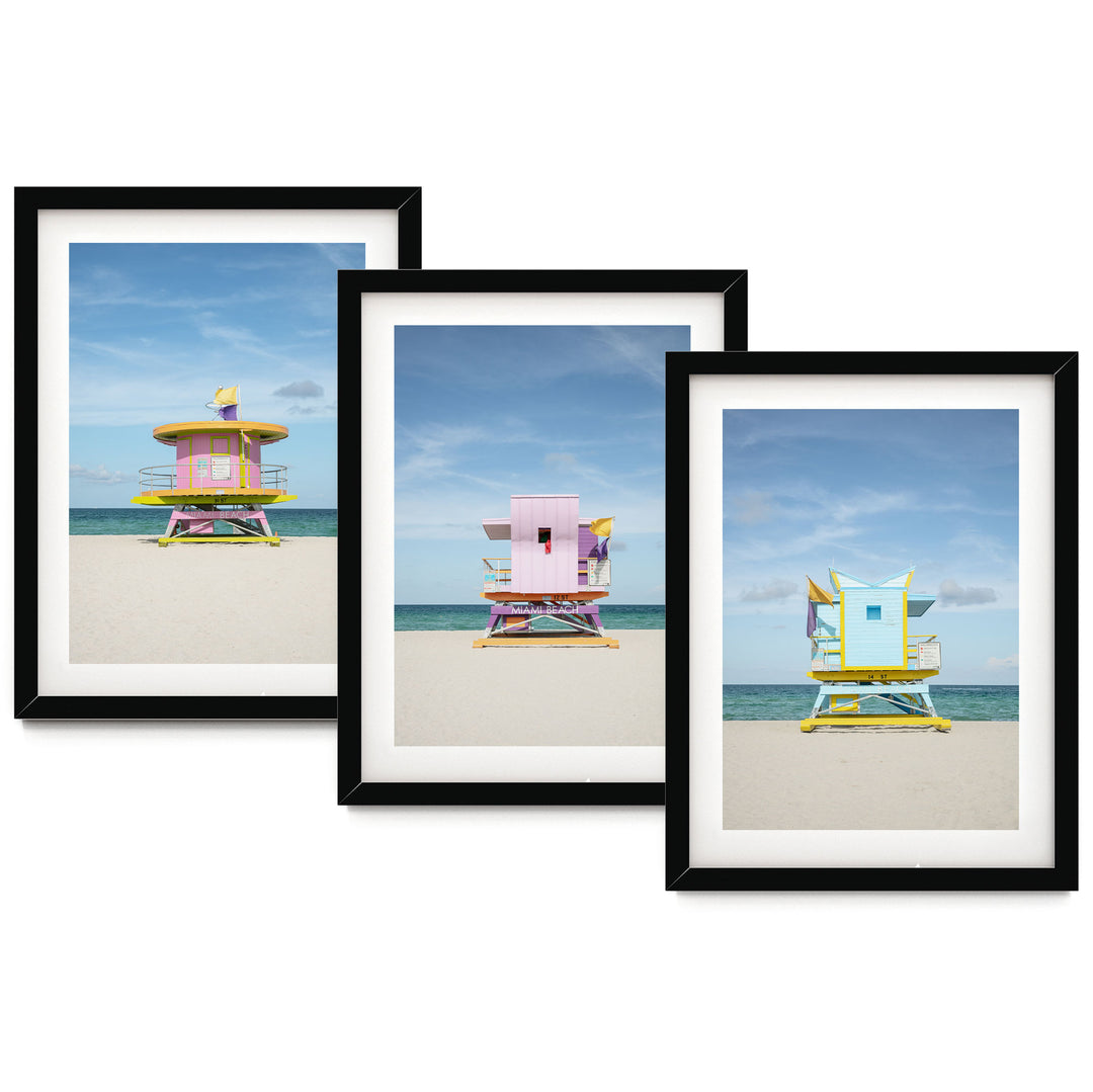 The image is a collage of three framed pictures, each depicting a lifeguard tower on a beach. The lifeguard towers are painted in various colors, including pink, yellow, and blue, and are situated on the sandy beach with the ocean in the background.