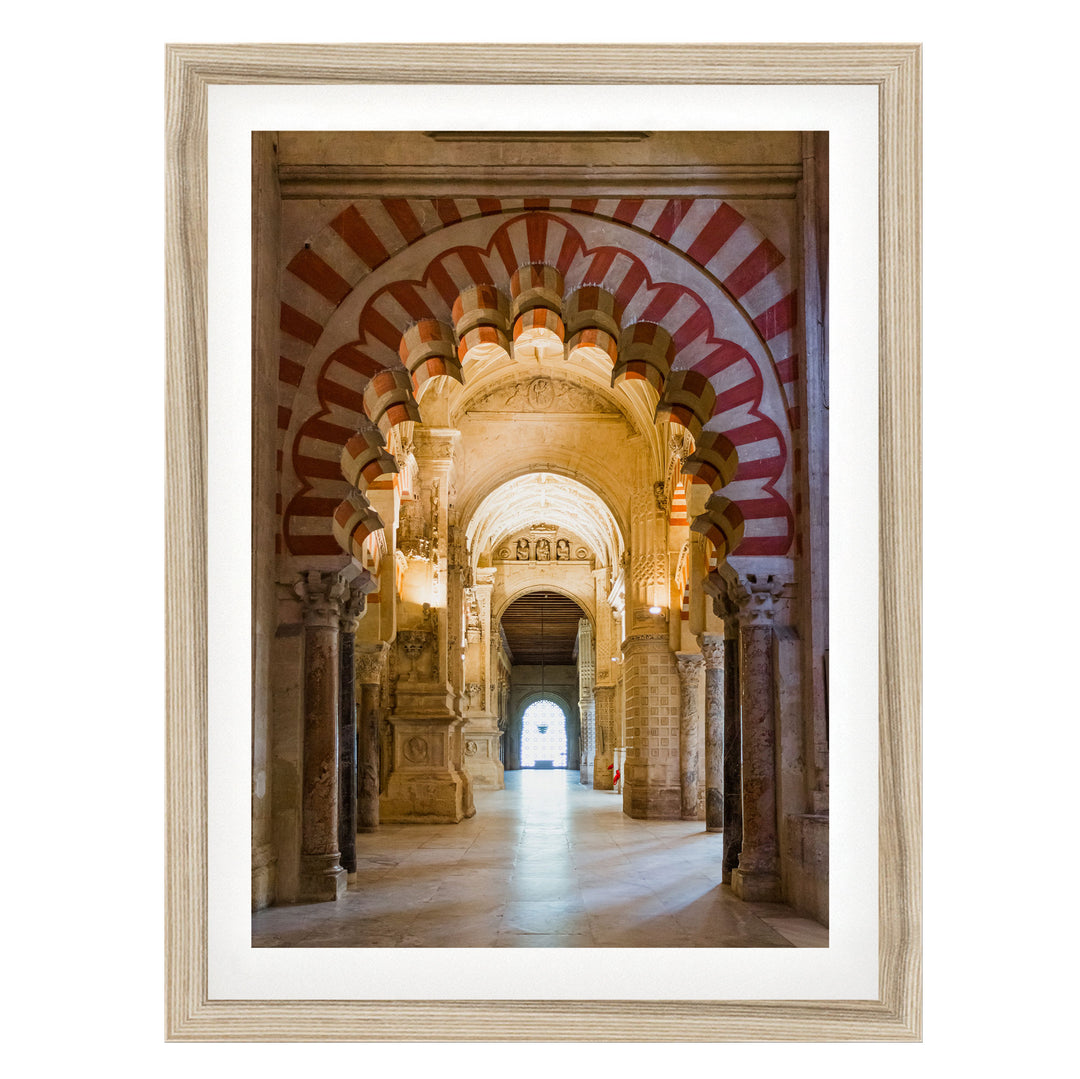 a grand, ornate hallway with arched doorways and columns, creating an impressive architectural space.