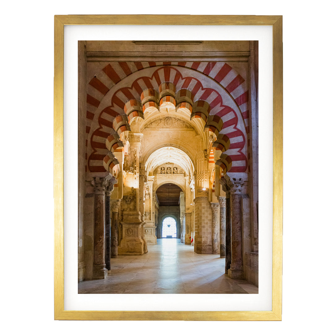 a grand, ornate hallway with arched doorways and intricate architectural details, including columns and arches.
