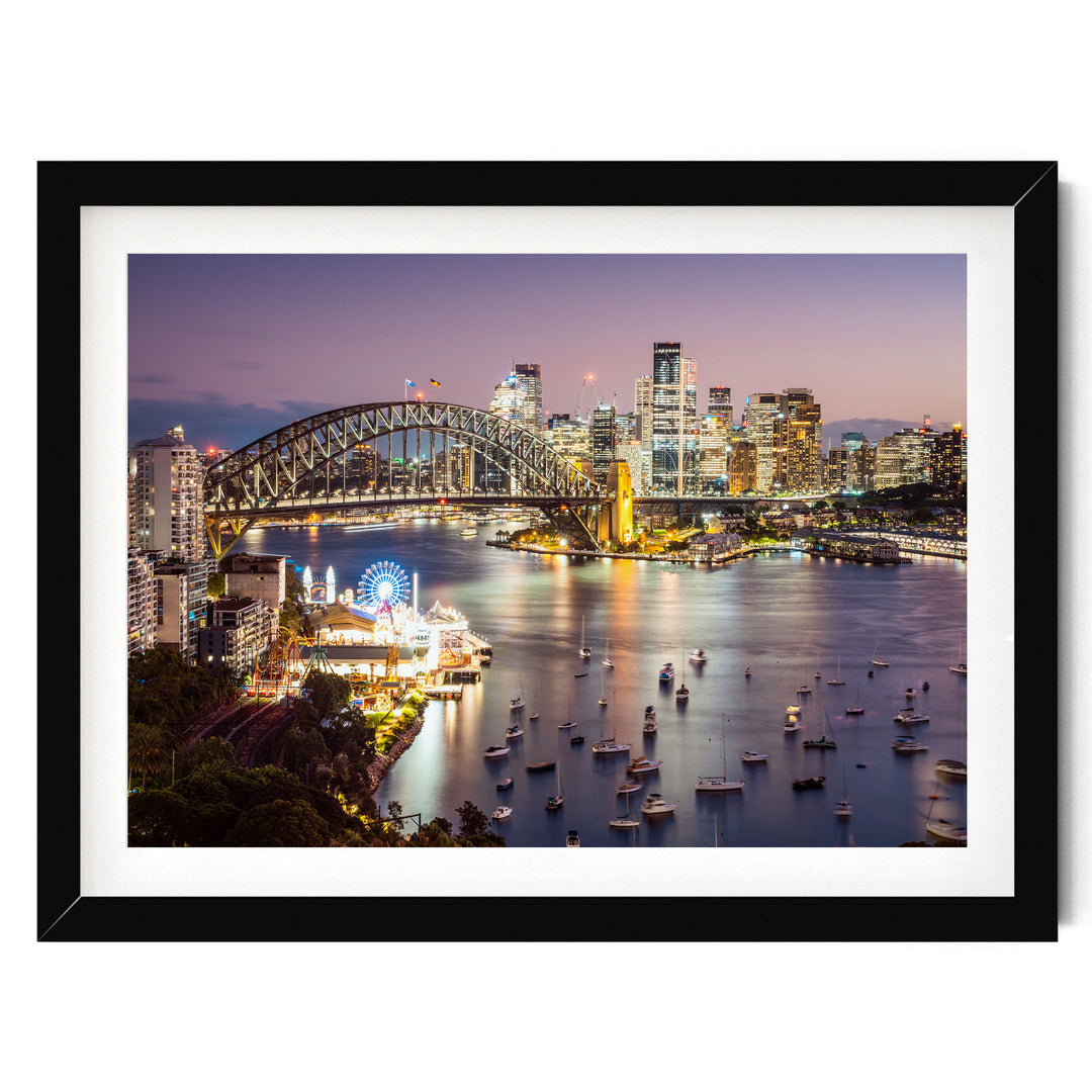 a vibrant cityscape at night, with a large bridge spanning a river and numerous boats dotting the water. The city skyline is illuminated by the lights of the buildings, creating a stunning and captivating scene.