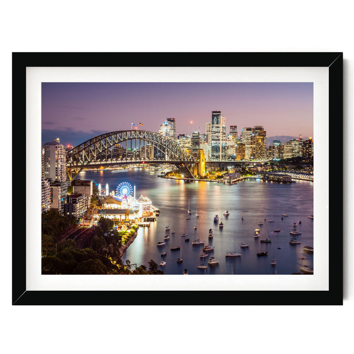 a vibrant cityscape at night, with a large bridge spanning a river and numerous boats dotting the water. The city skyline is illuminated by the lights of the buildings, creating a stunning and captivating scene.