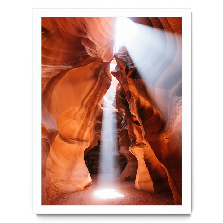 a stunning natural landscape with a narrow passage flanked by towering rock formations, creating a sense of depth and mystery.