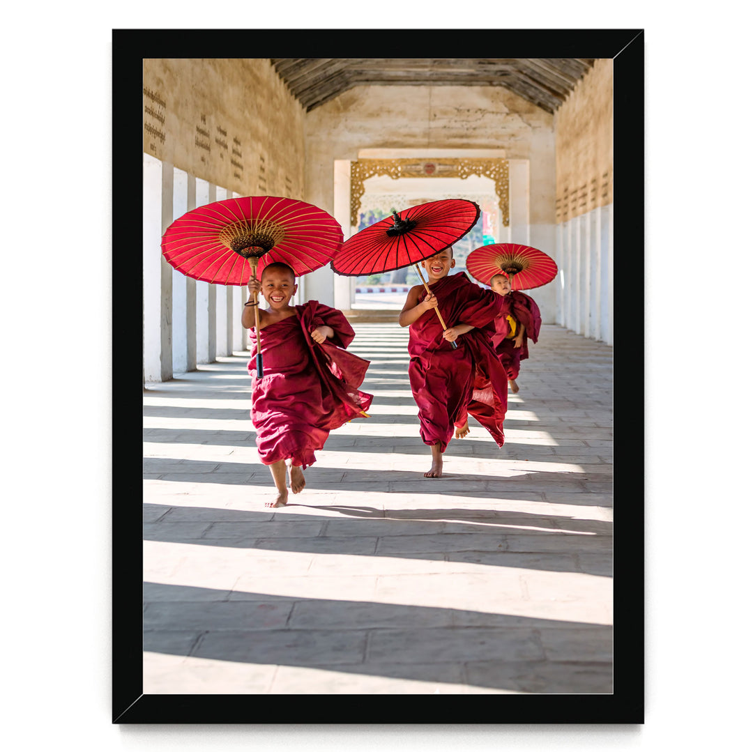 A group of people wearing red robes and carrying red umbrellas are walking down a hallway with a high ceiling and arched windows.