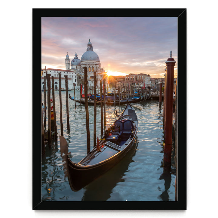 a serene scene of a gondola floating on the water, with a picturesque view of the Grand Canal in Venice, Italy, and the iconic St. Mark's Basilica in the background.