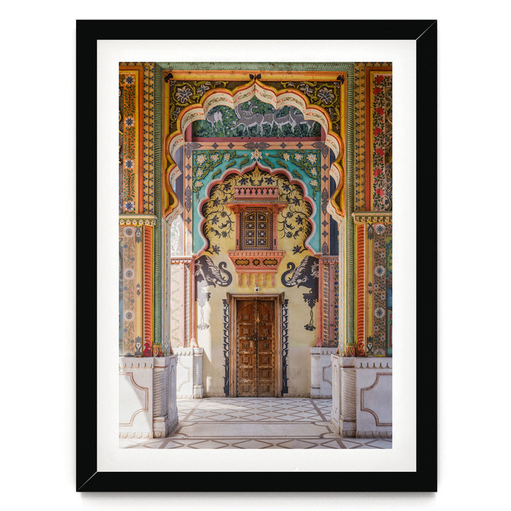a colorful and ornate doorway with intricate patterns and designs, including a wooden door and columns.