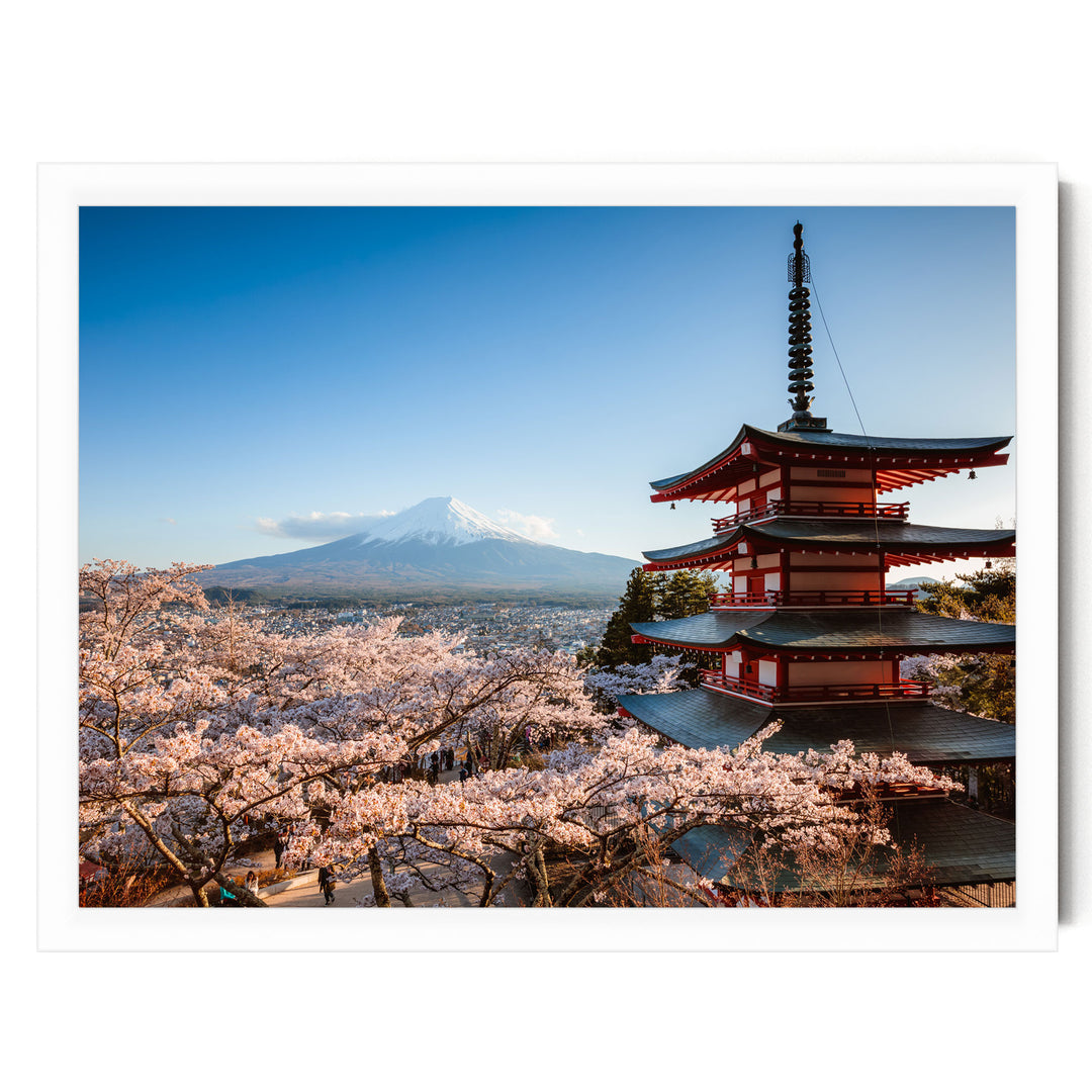 A traditional Japanese pagoda stands in the foreground, with cherry blossoms in full bloom in the background, against a backdrop of a snow-capped mountain.