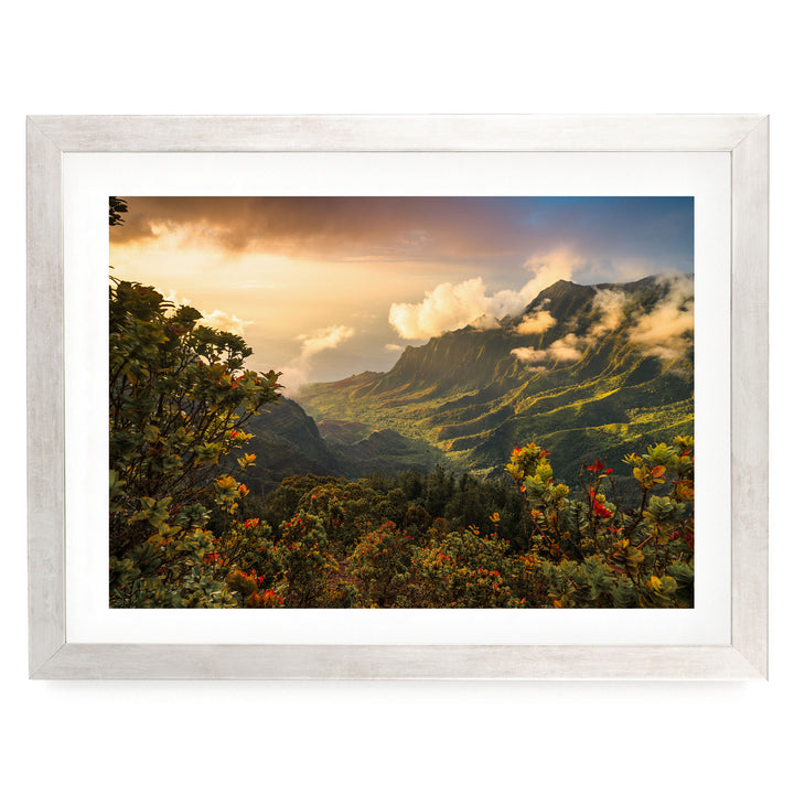 a breathtaking mountainous landscape with lush greenery, vibrant flowers, and a stunning sunset sky.