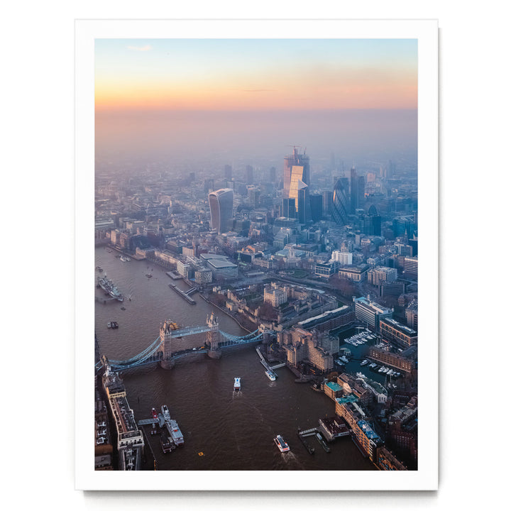 An aerial view of the London skyline, showcasing the iconic Tower Bridge and the surrounding cityscape.