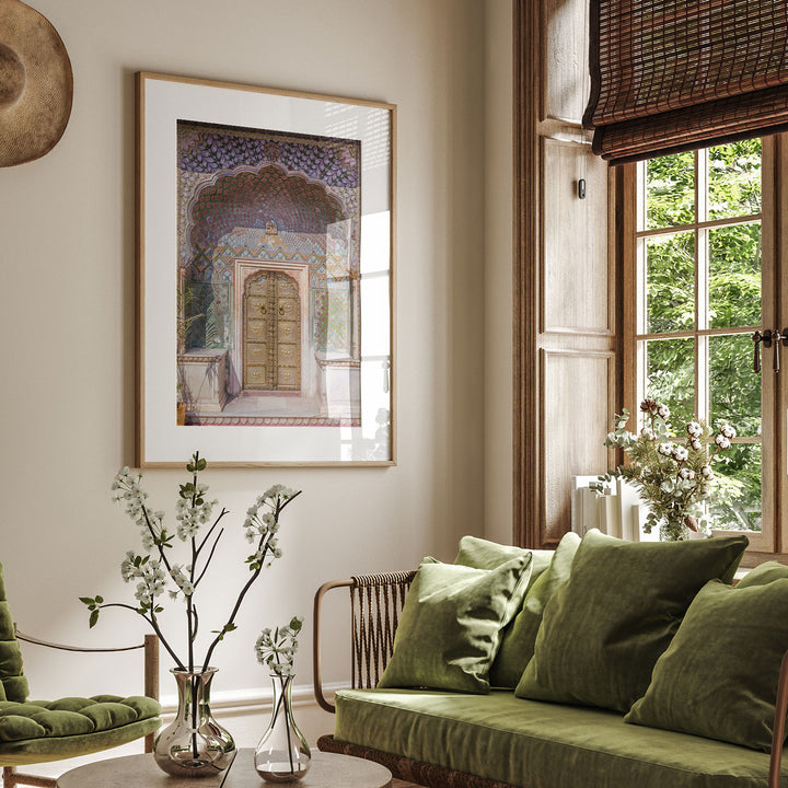 a living room filled with furniture and a painting on the wall