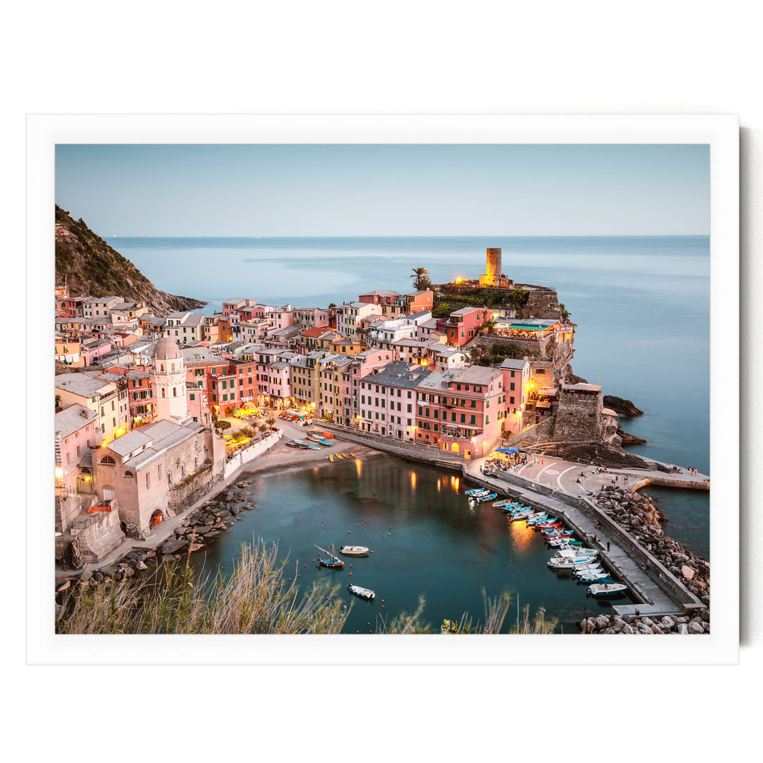 a picturesque coastal town with colorful buildings, a lighthouse on a cliff, and a harbor filled with boats.
