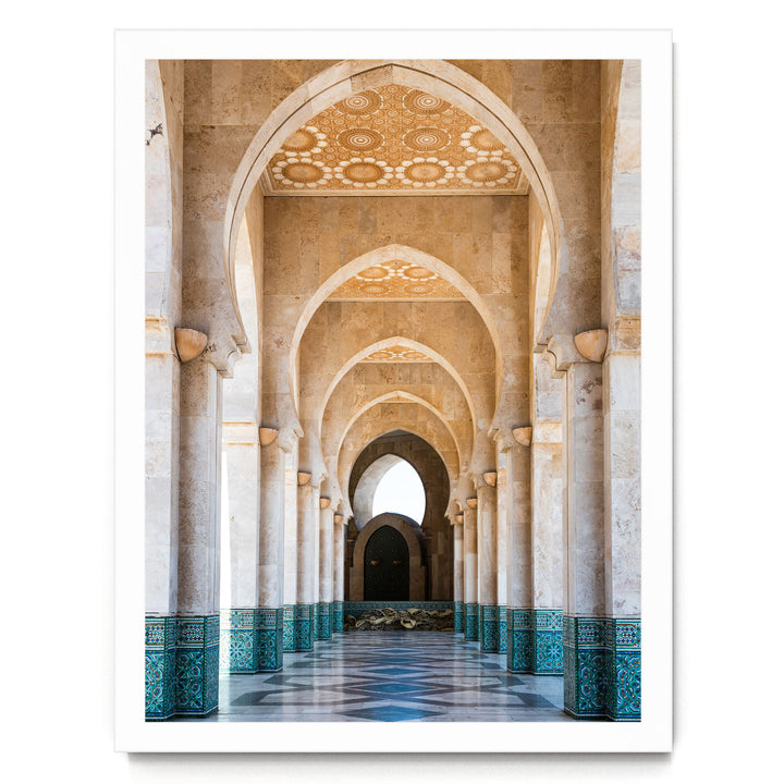 a long, ornate hallway with arched doorways and columns, creating a sense of depth and grandeur.