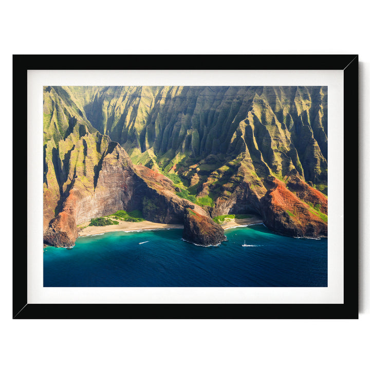 a stunning coastal landscape with towering cliffs, a deep blue ocean, and a small island in the center.