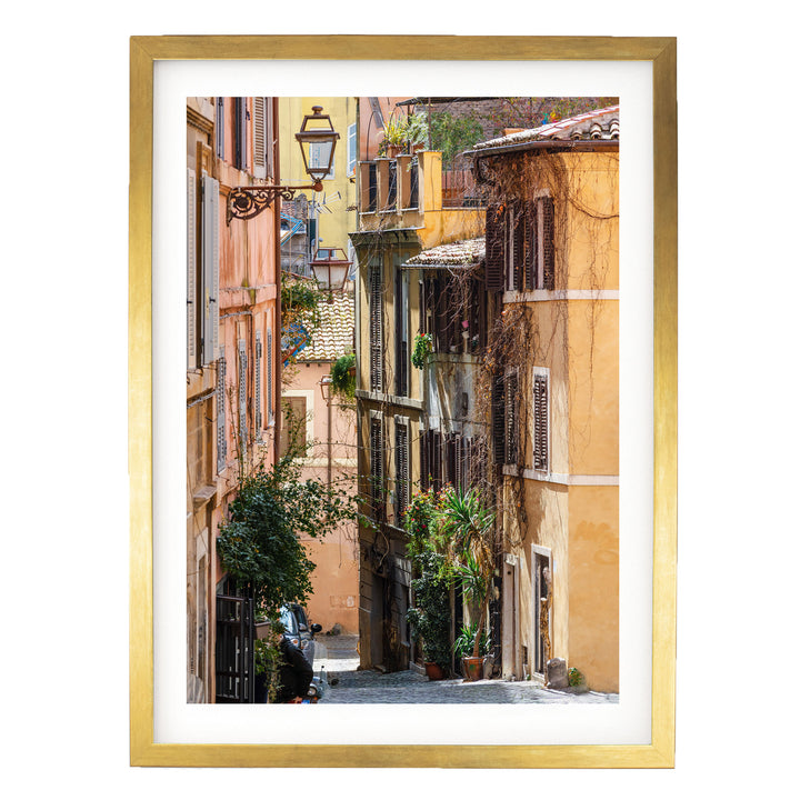 a narrow, charming street lined with colorful buildings, featuring balconies and shutters, creating a picturesque and inviting atmosphere.