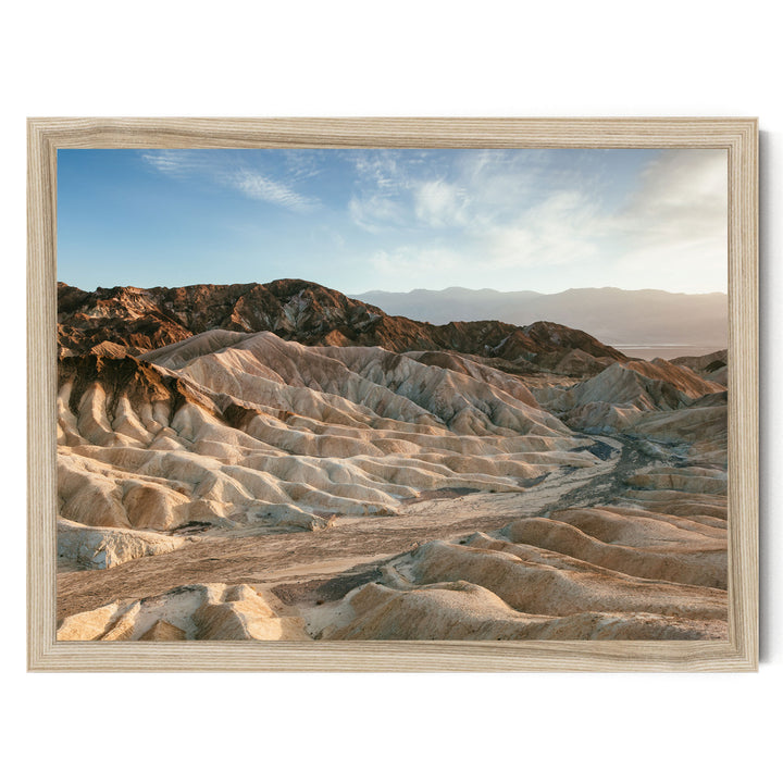 a vast, rugged landscape with rolling hills and valleys, showcasing the natural beauty of the terrain.