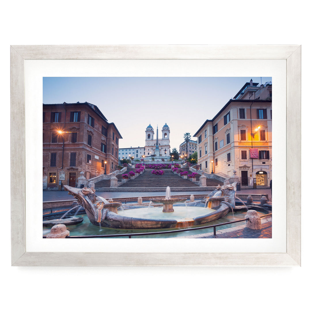 a picturesque scene of a fountain surrounded by ornate statues and buildings, with a church in the background.