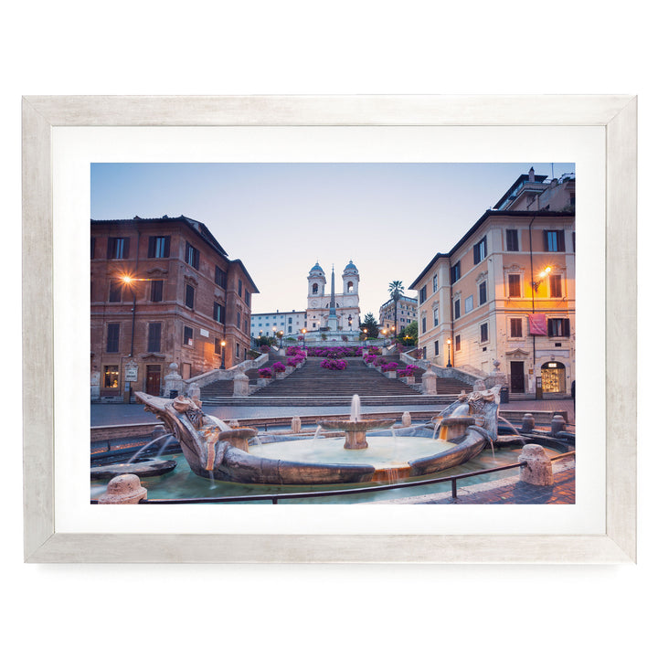 a picturesque scene of a fountain surrounded by ornate statues and buildings, with a church in the background.