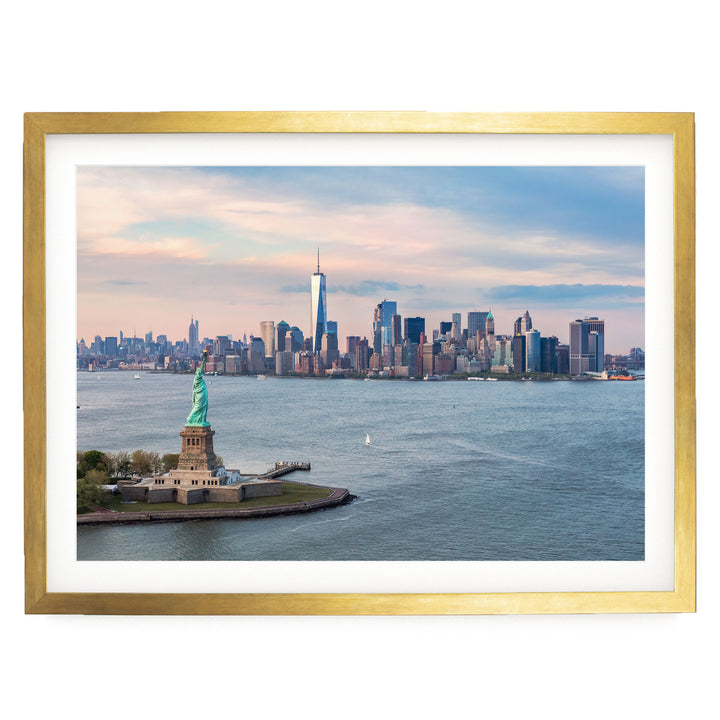 the Statue of Liberty in the foreground, with the New York City skyline visible in the background.