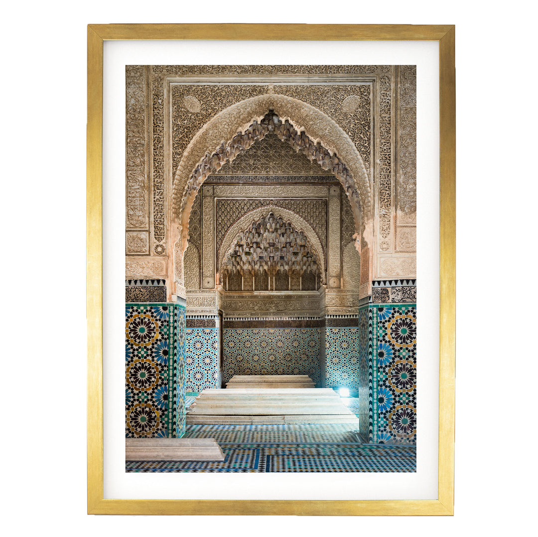 an ornate, intricately decorated interior with a large archway, colorful tiles, and a tiled floor.