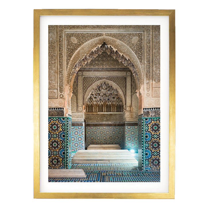an ornate, intricately decorated interior with a large archway, colorful tiles, and a tiled floor.