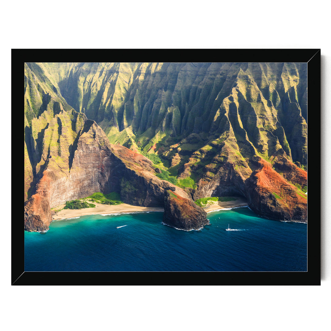 a stunning coastal landscape with towering cliffs, a deep blue ocean, and a sandy beach.