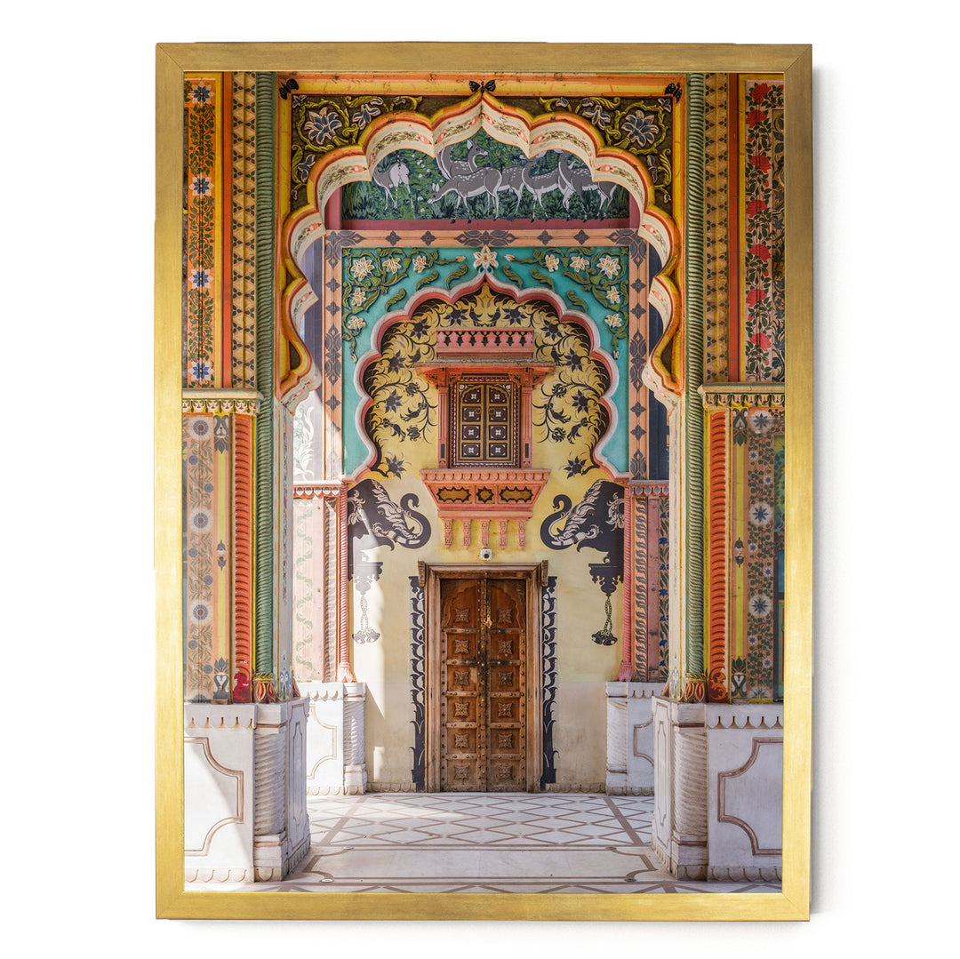 a colorful and ornate doorway with intricate patterns and designs, including arches, columns, and a wooden door.