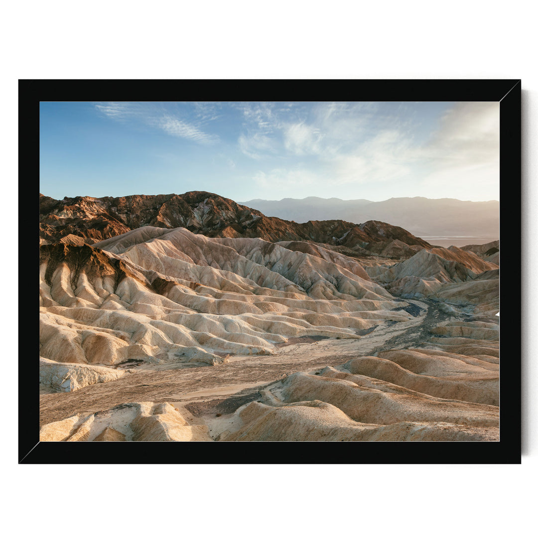 a vast, rugged landscape with rolling hills and valleys, showcasing the natural beauty of the terrain.