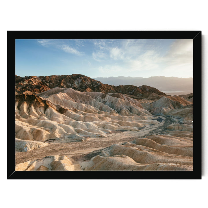 a vast, rugged landscape with rolling hills and valleys, showcasing the natural beauty of the terrain.