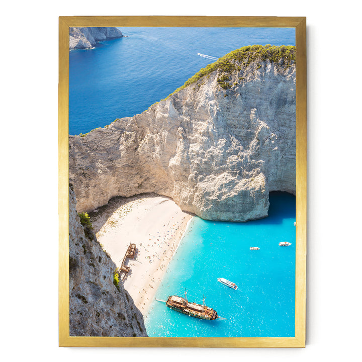a picturesque coastal scene with a rocky cliff overlooking a turquoise sea dotted with boats.
