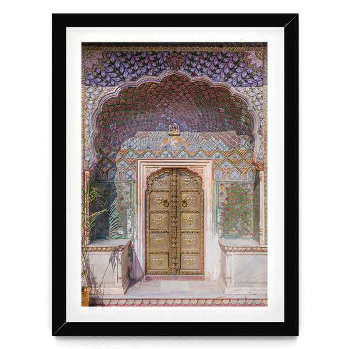 a beautifully decorated doorway with intricate patterns and designs, including a large archway and ornate golden doors.