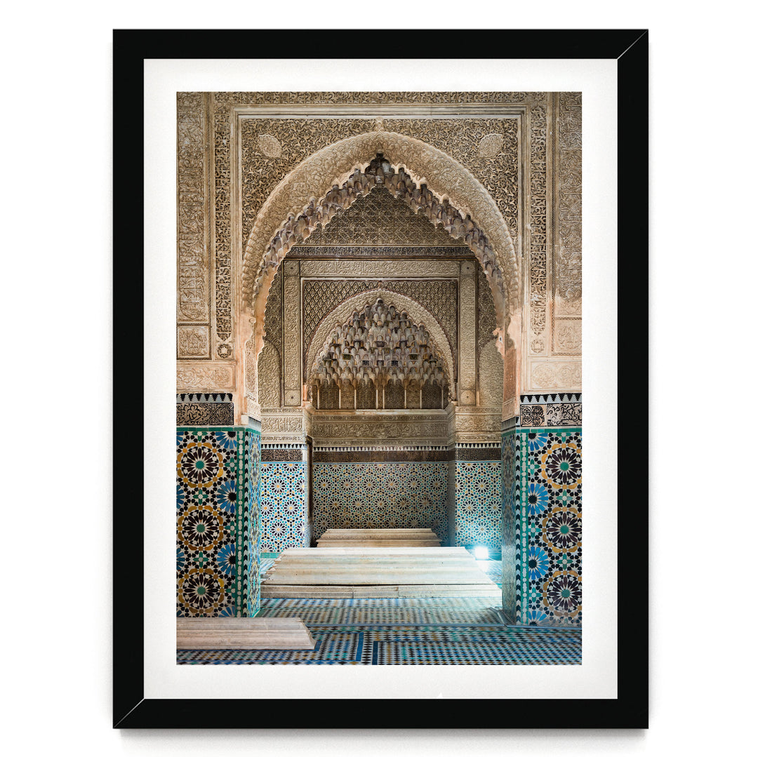 an ornate, intricately decorated interior space with a large archway, tiled walls, and a tiled floor.