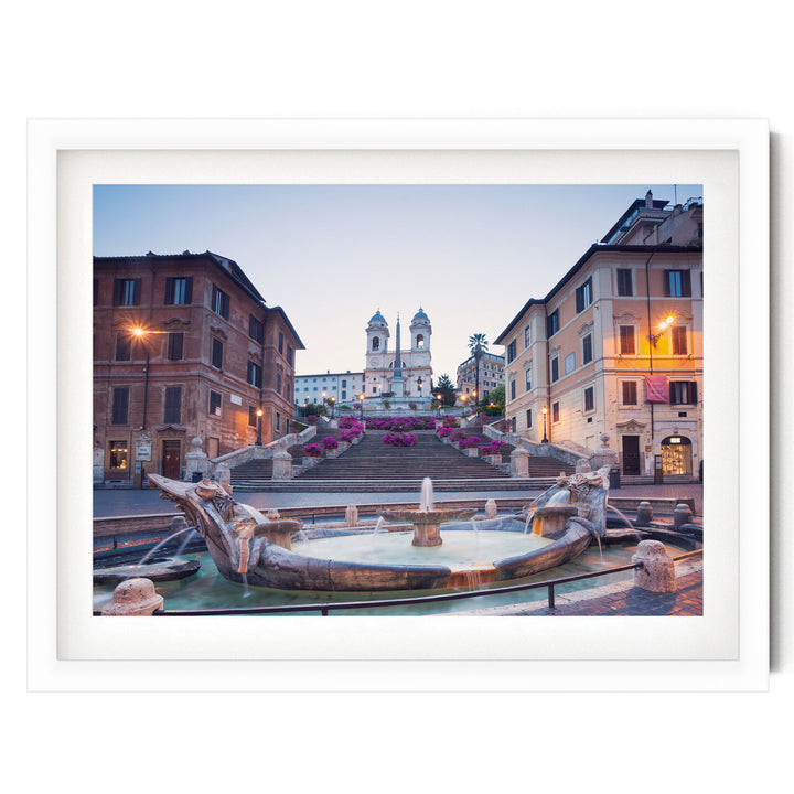 a picturesque scene of a fountain surrounded by ornate buildings, with a church steeple visible in the background.